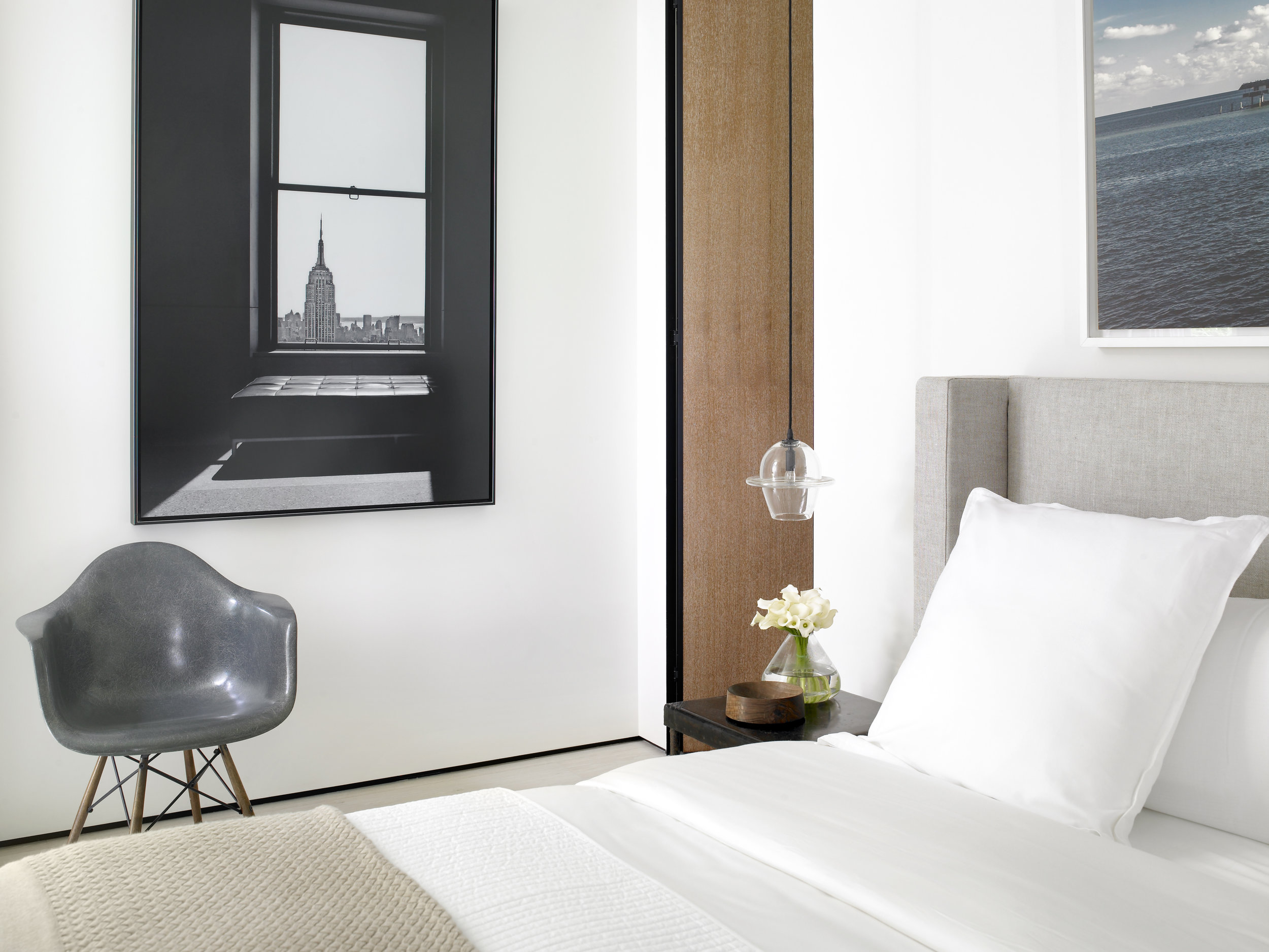 Layered guest bedroom interior